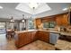 Spacious kitchen with granite countertops, stainless steel appliances, and breakfast bar at 149 Sheryl Dr, Deltona, FL 32738