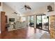 Spacious living room with high ceilings, beautiful fireplace, and large sliding doors to the pool at 149 Sheryl Dr, Deltona, FL 32738