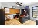 Comfortable office space with desk, rocking chair, and a large window at 149 Sheryl Dr, Deltona, FL 32738