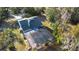 Aerial view of screened-in pool, screened enclosure and view of the roof at 149 Sheryl Dr, Deltona, FL 32738