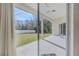 Covered patio with view of the backyard, offering serene outdoor relaxation and entertainment space at 163 Chrysanthemum Dr, Ormond Beach, FL 32174