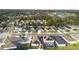 Community overview showcasing numerous homes with solar panels at 164 E Fiesta Key Loop, Deland, FL 32720