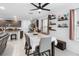Bright dining room with seating for six and decorative shelves at 164 E Fiesta Key Loop, Deland, FL 32720