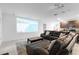 Dedicated home theater with projector and comfortable seating at 164 E Fiesta Key Loop, Deland, FL 32720