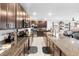 Modern kitchen featuring granite countertops and stainless steel appliances at 164 E Fiesta Key Loop, Deland, FL 32720