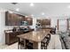 Spacious kitchen featuring an island and stainless steel appliances at 164 E Fiesta Key Loop, Deland, FL 32720