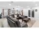 Relaxing living room with sectional sofa and access to backyard at 164 E Fiesta Key Loop, Deland, FL 32720