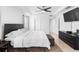 Main bedroom with a king-size bed and ample closet space at 164 E Fiesta Key Loop, Deland, FL 32720