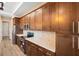 Well-equipped kitchen featuring stainless steel appliances and beautiful wood cabinetry at 177 Rosedale Dr, Deltona, FL 32738