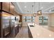 Contemporary kitchen with an island and stainless steel appliances at 177 Rosedale Dr, Deltona, FL 32738