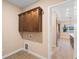 Laundry room featuring cabinetry, a sink, and connections for laundry machines at 177 Rosedale Dr, Deltona, FL 32738