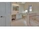 Bathroom featuring a vanity, toilet, bathtub and shower at 2075 Little Farms Ct, Deltona, FL 32738