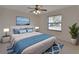 Bedroom with large bed and nautical decor at 2075 Little Farms Ct, Deltona, FL 32738