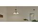 Open dining area with a chandelier and a view into another room, ideal for Gathering dinners at 2075 Little Farms Ct, Deltona, FL 32738