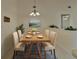 Formal dining area with a rustic wooden table and seating, perfect for Gathering dinners and gatherings at 2075 Little Farms Ct, Deltona, FL 32738