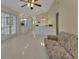 Spacious living area with tile flooring, recessed lighting, and neutral wall color at 2075 Little Farms Ct, Deltona, FL 32738