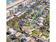 Panoramic aerial view of a coastal community with nearby beach access and well-maintained streets at 24 Sea Gull Dr, Ormond Beach, FL 32176