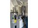 Utility room with water heater and HVAC system at 24 Sea Gull Dr, Ormond Beach, FL 32176