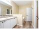 Double vanity bathroom with a shower and tub at 242 W Fiesta Key Loop, Deland, FL 32720