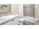 Clean bathroom with a shower/tub combo and tile flooring at 242 W Fiesta Key Loop, Deland, FL 32720