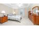 Bright bedroom with double dresser and nightstands at 242 W Fiesta Key Loop, Deland, FL 32720
