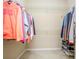 Walk-in closet with double hanging rods and shoe rack at 242 W Fiesta Key Loop, Deland, FL 32720