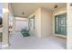 Front porch with green rocking chairs, offering a relaxing space at 242 W Fiesta Key Loop, Deland, FL 32720