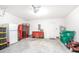 Garage with storage cabinets and work bench at 242 W Fiesta Key Loop, Deland, FL 32720