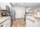 Modern kitchen with stainless steel appliances at 242 W Fiesta Key Loop, Deland, FL 32720