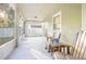 Screened porch with view of backyard and a tranquil setting at 242 W Fiesta Key Loop, Deland, FL 32720