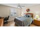 Bedroom with natural light from the window and a nice desk area at 2610 Hialeah Ave, The Villages, FL 32162