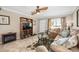Comfortable living room featuring a media center, fireplace, and tile floors at 2711 N Halifax Ave # 184, Daytona Beach, FL 32118