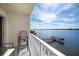 Balcony view featuring outdoor seating and stunning views of the water and nearby pier at 2711 N Halifax Ave # 463, Daytona Beach, FL 32118