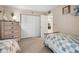 Comfortable bedroom with twin beds, ample storage, and access to other areas of the house at 2711 N Halifax Ave # 463, Daytona Beach, FL 32118