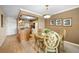 Dining area featuring a decorative table set, adjacent to the kitchen and living spaces at 2711 N Halifax Ave # 463, Daytona Beach, FL 32118