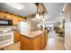Open kitchen with island, flows to the living area, and offers scenic water views at 2711 N Halifax Ave # 463, Daytona Beach, FL 32118