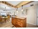 Kitchen island with drawers and cabinets, open to the dining and living areas at 2711 N Halifax Ave # 463, Daytona Beach, FL 32118