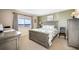 Bright main bedroom featuring a serene view, light-colored walls, and coordinating furniture at 2711 N Halifax Ave # 463, Daytona Beach, FL 32118