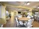 Large recreation room featuring seating areas with round tables and chairs perfect for socializing at 2711 N Halifax Ave # 463, Daytona Beach, FL 32118