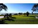 Landscaped backyard with a waterfront view at 2728 S Peninsula, Daytona Beach, FL 32118