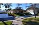 Ranch-style home with a large front yard and mature trees at 2728 S Peninsula, Daytona Beach, FL 32118