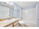Bathroom featuring a shower-tub combo and updated vanity at 3180 Ocean Shore Blvd # 309, Ormond Beach, FL 32176