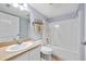Bathroom with a tub, vanity, and neutral finishes creating a clean, relaxing space at 3180 Ocean Shore Blvd # 309, Ormond Beach, FL 32176
