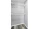 Walk-in closet featuring gray wood-look flooring and white wire shelving at 3180 Ocean Shore Blvd # 309, Ormond Beach, FL 32176