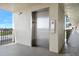 A stainless steel elevator sits outside on the building's facade at 3180 Ocean Shore Blvd # 309, Ormond Beach, FL 32176