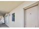 Exterior hallway leads to condo unit entrance at 3180 Ocean Shore Blvd # 309, Ormond Beach, FL 32176