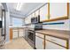 Updated kitchen featuring stainless steel appliances and neutral countertops at 3180 Ocean Shore Blvd # 309, Ormond Beach, FL 32176