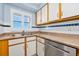 Kitchen featuring neutral countertops and cabinetry at 3180 Ocean Shore Blvd # 309, Ormond Beach, FL 32176