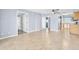 Bright and airy living room featuring tiled floors and plenty of space for entertaining and relaxing at 3180 Ocean Shore Blvd # 309, Ormond Beach, FL 32176