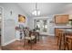 Cozy dining area with ample natural light and access to the backyard at 35909 Joewood Ave, Leesburg, FL 34788